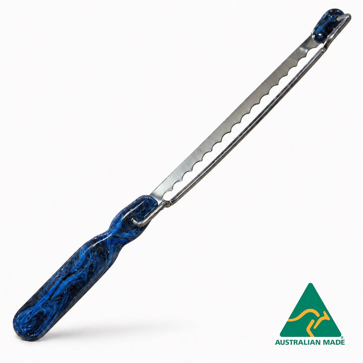 Think4Earth blue &amp; black marbled recycled plastic handle bread saw with adjustable slice guide and stainless steel blade.