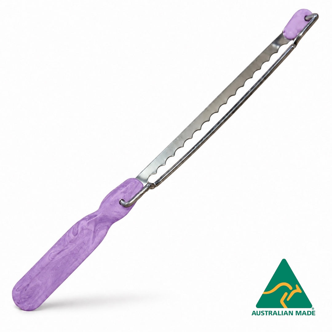 Think4Earth adjustable bread saw with marbled purple recycled HDPE handle and stainless steel blade.