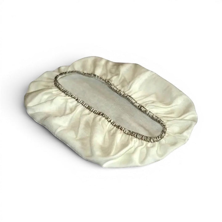 Think4Earth cream-colored oval banneton cloth liner for 0.5kg bread dough, made from natural materials.