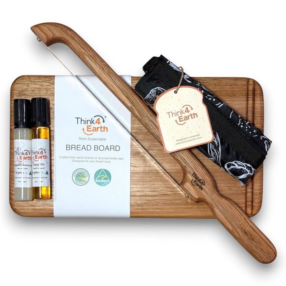 Think4Earth Ultimate Bread Keeper's Bundle includes Tasmanian oak board, bread saw, two oils, and reusable bread bag.