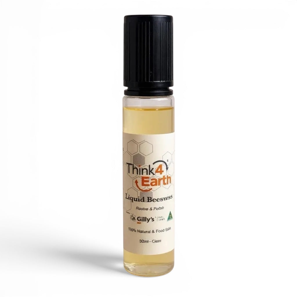 Think4Earth Liquid Beeswax wood polish in a 30ml clear glass bottle with a black cap. Natural wood care.