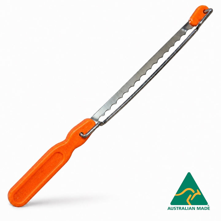 Think4Earth orange recycled plastic bread saw with adjustable slice guide and stainless steel blade.