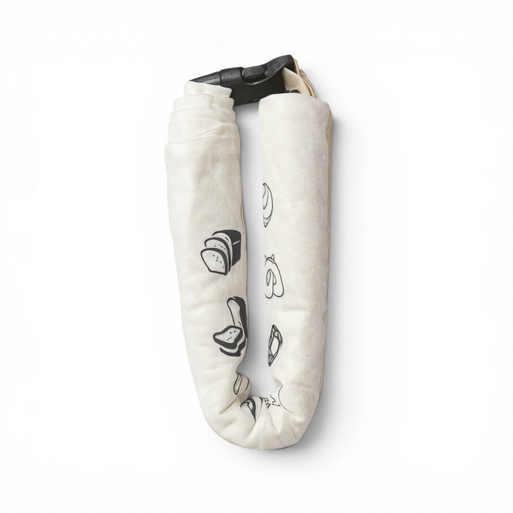 Think4Earth reusable organic cotton bread bag with bread illustrations, closed with a clip.