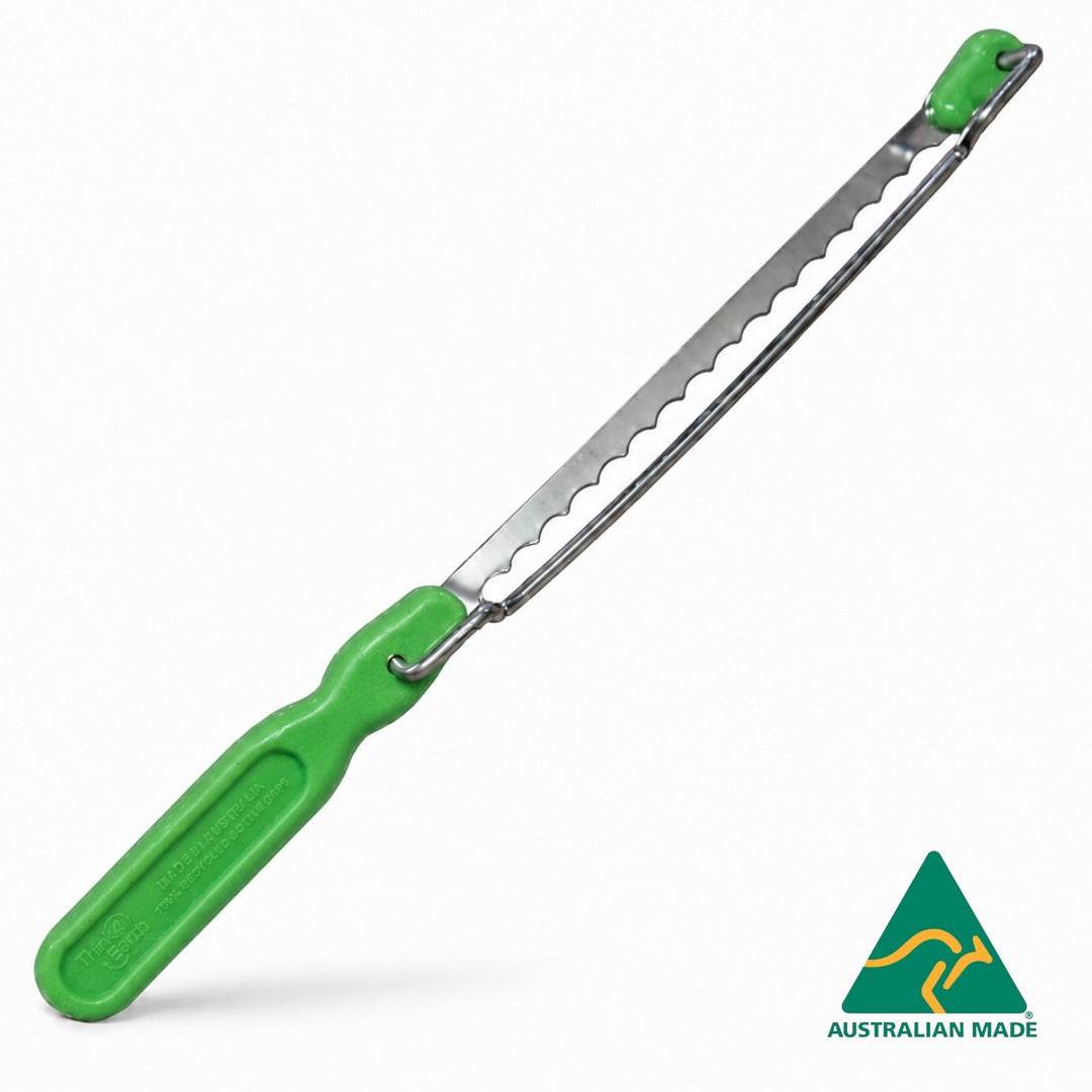 Think4Earth green recycled plastic handle bread saw with adjustable stainless steel blade and brass fittings.