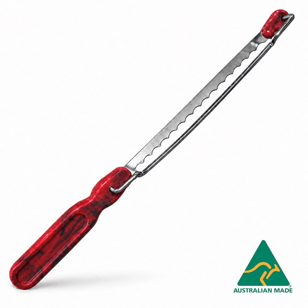Think4Earth red and black marbled recycled plastic bread saw with adjustable slice guide and stainless steel blade.