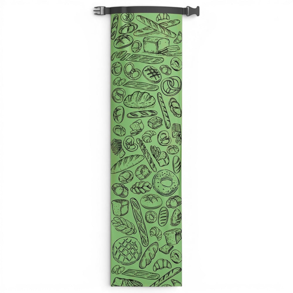 Think4Earth reusable baguette bag in green with a black line drawing pattern of various breads and pastries. Made from rPET.