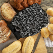 Think4Earth black reusable bread bag with white line art of various baked goods, made from recycled plastic bottles.