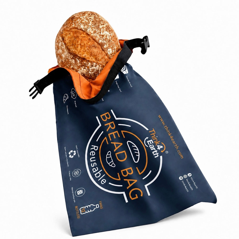 Think4Earth reusable blue bread bag made from recycled plastic bottles, with a roll-and-clip closure, holding a loaf of bread.