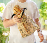 Think4Earth Reusable Bread Bag in dark brown with a bread print, made from rPET. Features a roll-and-clip closure.