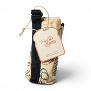 Think4Earth reusable bread bag in tan with a bread print, made from recycled plastic bottles. Features a roll-and-clip closure.