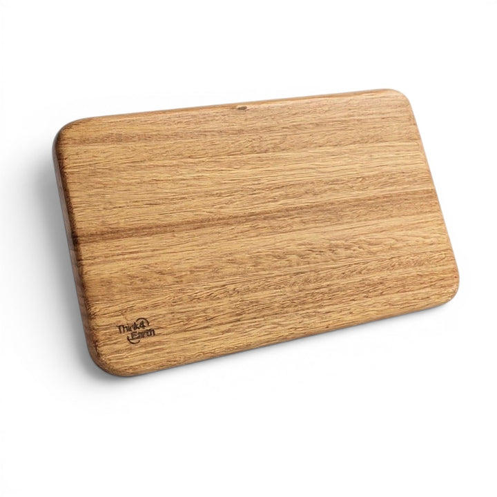 Think4Earth Tasmanian Oak bread board with a cut-through groove, finished with food-safe tung oil.