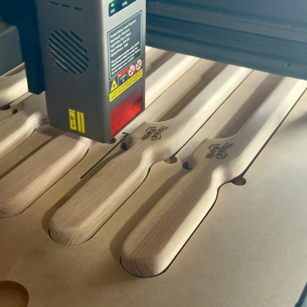 Think4Earth Tasmanian Oak bread saw with stainless steel blade, handcrafted in Australia.